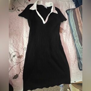 This is a beautiful simple black dress that fits very well and is comfortable.